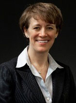 Erin O’Gorman, President, CBSA. Erin is a woman with short brown hair.
